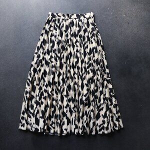 pleated animal print midi skirt